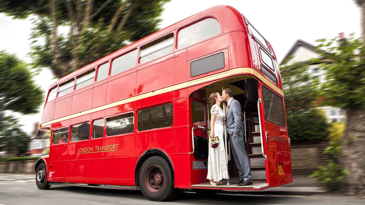 bride-groom-kissing-on-bus